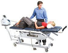 Woman receiving treatment for a herniated disc